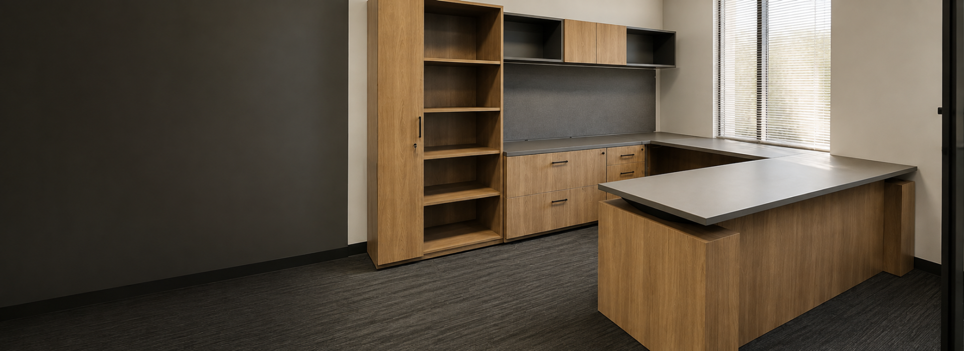 Gorgeous transitional CONNECT custom private office built by Office Furniture Connection with light wood laminate sit-stand desk, built-in wall unit with credenza, overhead and wardrobe storage, and black task chair.