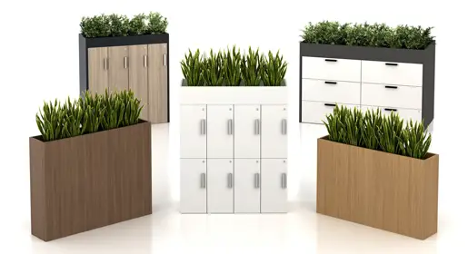 Modular dry planters with lush green faux plants integrated into the top of white laminate locker units, lateral files and planters, arranged in a clean white studio setting. Ideal for green design and space division in offices, enhancing wellness and visual appeal without maintenance.