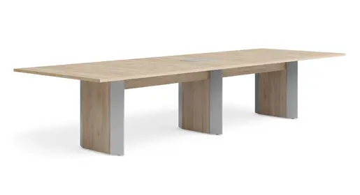 Logiflex Arrow long rectangular conference table featuring a light wood-grain laminate surface and contemporary curved panel legs with metallic accents, shown against a plain white background. Sleek and professional design ideal for collaborative meetings among OFC's durable office tables.