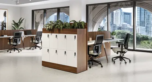 Configurable Logiflex wood laminate lockers with contrasting white doors and a built-in top planter space for bringing nature into team storage areas