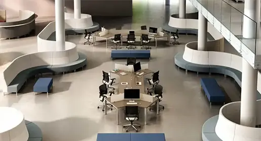 Areal view of dogbone benching systems with accoustic privacy dividers and ergonomic task chairs surrounded by modular seating groupings for open conversations