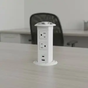 MOD In Surface power receptacle in white placed into a laminate worksurface for easy access to power and data on worksurfaces, conference and training tables.