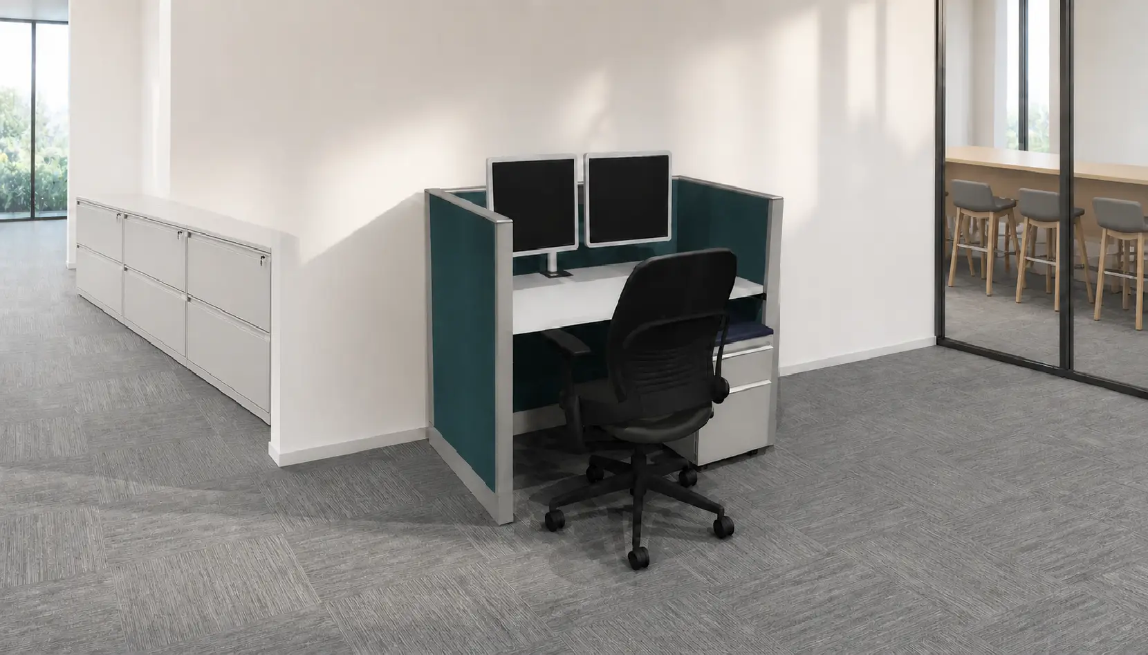 3D rendering of 1 Knoll Morrison remanufactured office furniture cubicle: 4' x 2' 42" high teal fabric panels, grey trim and worksurface with dual monitor arm and mobile box/file pedestal used for call centers and hybrid working. A refurbished Steelcase Leap task chair in black fabric completes the workstation.