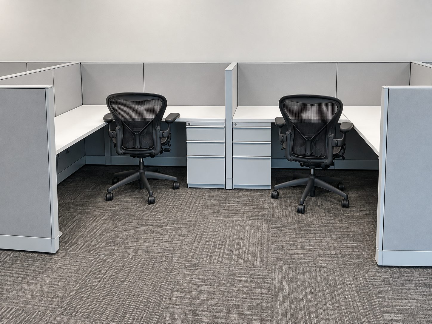 Remanufactured Knoll Morrison workstations with pre-owned Herman Miller Aeron task chairs