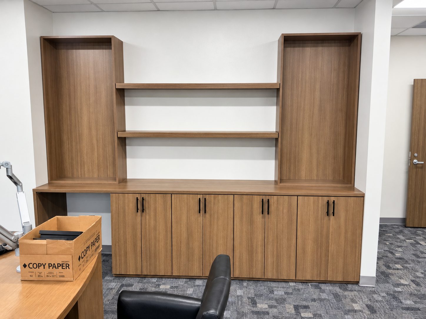 Custom built-in cabinetry and floating shelves built by VOIS woodshop